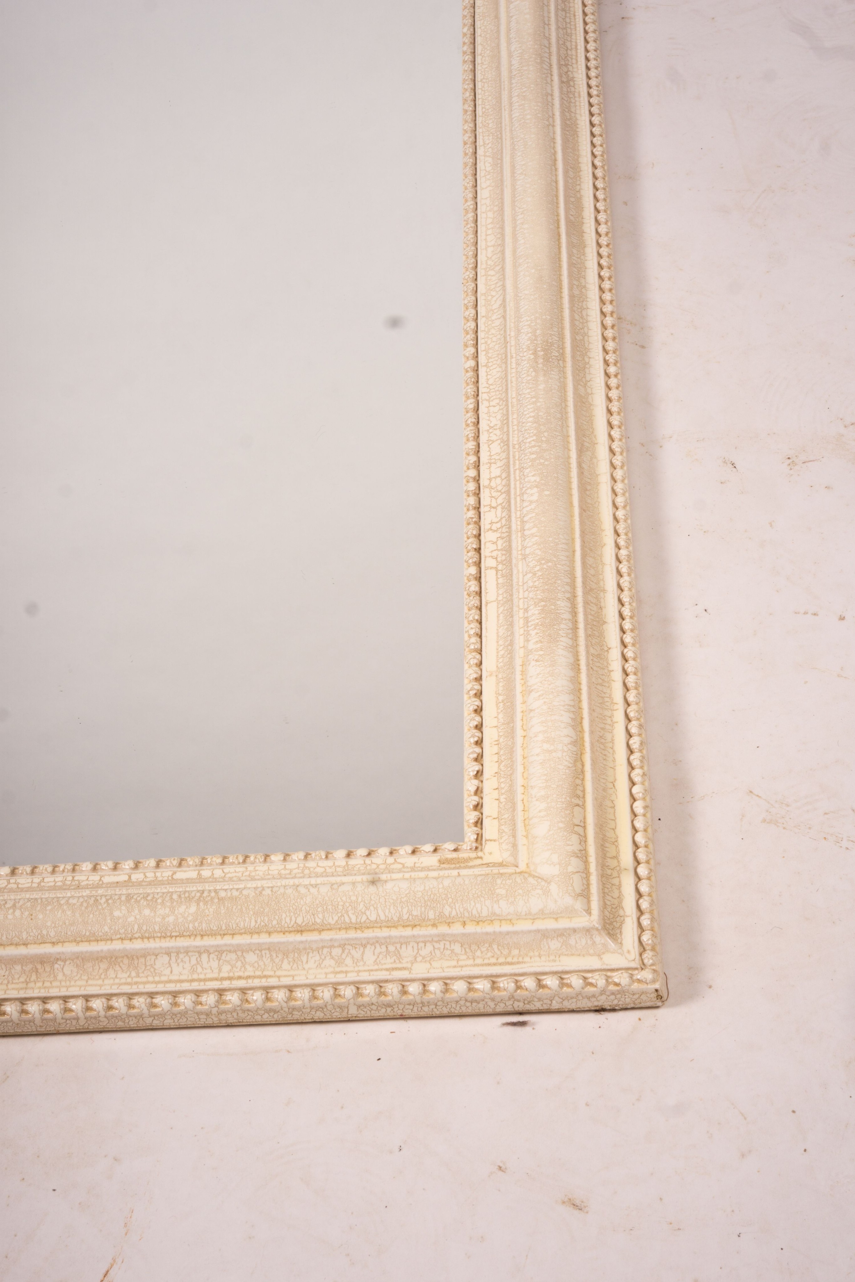 A Laura Ashley overmantel mirror, W.86cm H.110cm